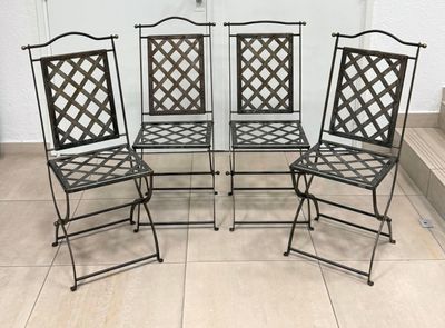 Suite de quatre chaises de jardin en fer forgé à motifs de c… - Photo 1