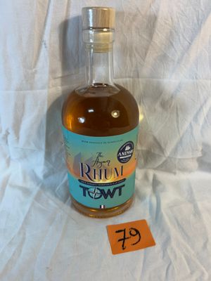 a bottle of rum that is sitting on a table