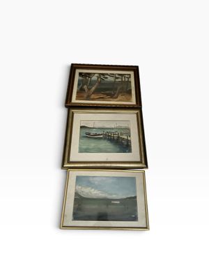 trois photos encadrées représentant des bateaux sur un fond blanc