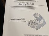 a box with a manual for a hand held device in it
