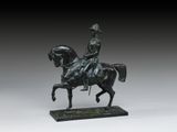 statue en bronze représentant un homme à cheval portant un casque