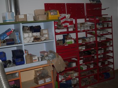 a room filled with lots of boxes and shelves