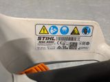 a close up of a plastic object with a sticker on it