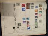a book with a bunch of stamps on it
