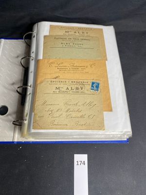 an old book with writing on it sitting on a table
