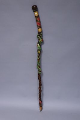 a close up of a stick with a stick handle on a table
