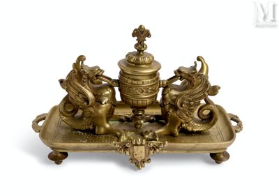 brass figurine of three lions on a tray with a cross on top