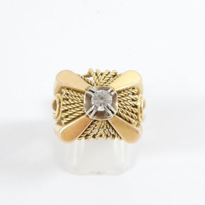 an image of a gold ring with a diamond in the center