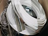 a cardboard box with a bunch of wires in it