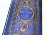 a blue book with gold trim and a blue cover
