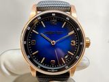 a watch that is being held by a glove