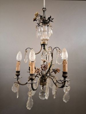 a chandelier with a bunch of lights hanging from it