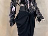 an image of a mannequin dressed in a black dress