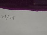 someone is writing on a piece of paper with a pen