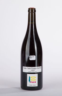a bottle of wine that is sitting on a table