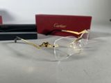 a pair of glasses sitting on a table next to a pair of glasses