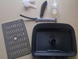 a picture of the contents of a kitchen sink and a drainer