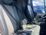 a view of the inside of a van from the driver ' s seat