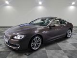 La BMW Série 6 Grano est garée dans un showroom