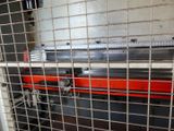 a machine that is working on a piece of metal