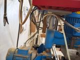 a picture of a machine that is working on a piece of wood