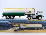 a toy truck that is sitting on top of a box