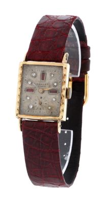 l'image d'une montre-bracelet avec un bracelet en cuir marron