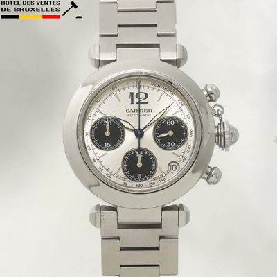 a close up of a wrist watch with a white background