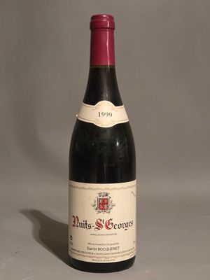a bottle of wine that is sitting on a table