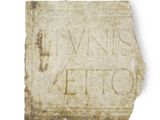 un vieux bloc de pierre sur lequel est inscrit « c'est Vetto »