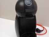 a coffee maker that is sitting on a table
