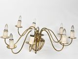 a large brass chandelier with five arms and five lights