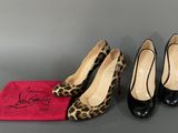 two pairs of black and leopard print high heel shoes next to a red bag