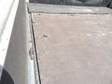 a man riding a skateboard down a ramp