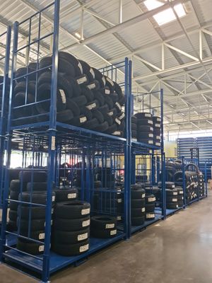 the warehouse is full of tires and racking for sale
