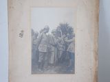 an old photo of a group of men standing next to each other