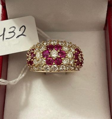 Bague Jonc, en or jaune, rehaussée de 3 motifs " Marguerite …
