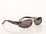 sunglasses on a white surface with a white background