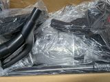 a box with a bunch of hair dryers in it