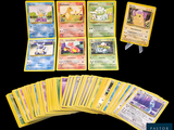 beaucoup de cartes pokemon sur la table