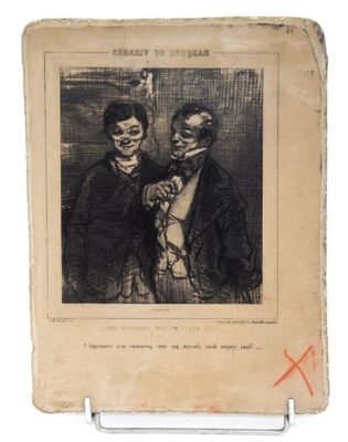 un vieux livre sur lequel figure le dessin de deux hommes debout l'un à côté de l'autre