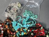 a lot of beads that are sitting on a table