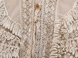 a close up of a dress on a mannequin mannequin