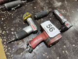 many tools that are laying out on the floor