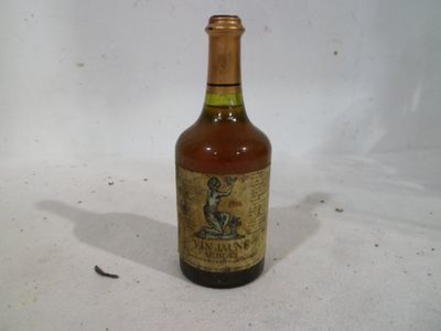 a bottle of wine that is sitting on a table