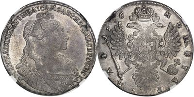 a silver coin with a crown on the front and a crown on the back