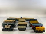 a lot of toy trains that are sitting on a table