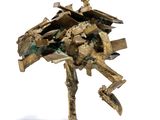 a bronze sculpture of a robot with a broken arm