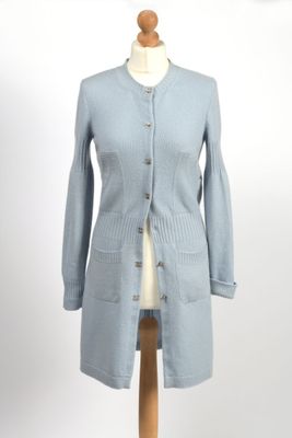 an image of a woman ' s coat on a mannequin