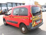 a red van with a yellow and red design on the side